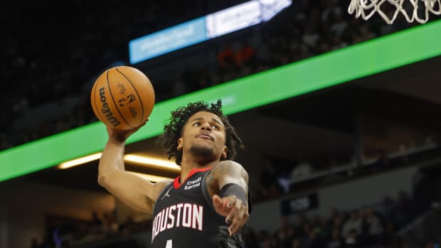 Rockets guard Jalen Green dunks against the Minnesota Timberwolves in the third quarter at Target Center.